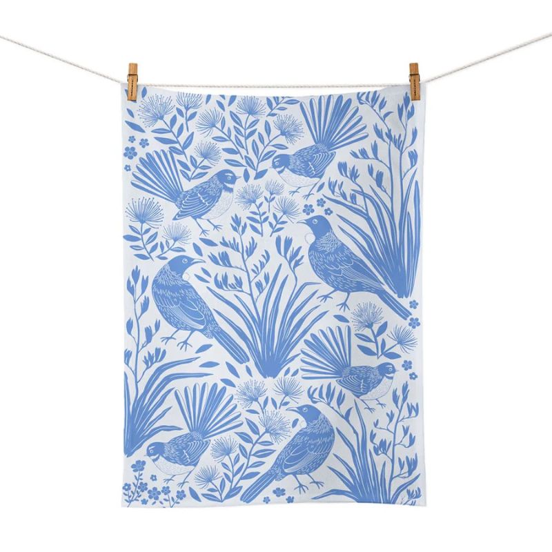 100%NZ Tea Towel – Birdsong Blues shown pegged to a line on a white background.
