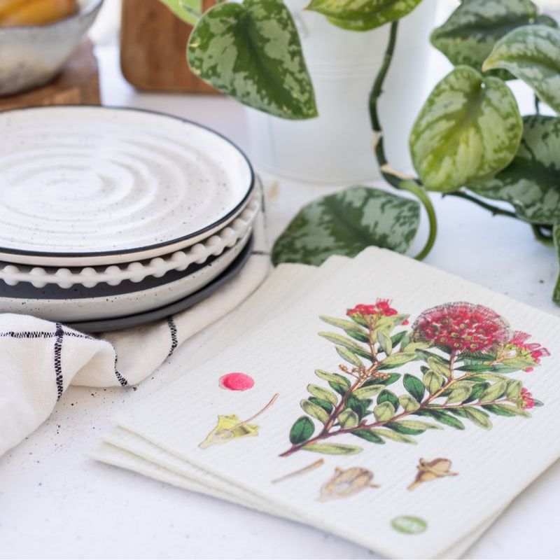 Set of 3 Swedish dish cloths featuring botanical illustrations of Northern Rātā, Mānuka, and Tree Fern.