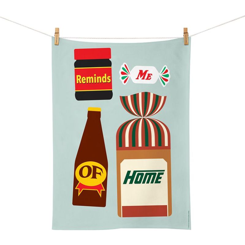 100%NZ Taste of Kiwi Tea Towel featuring Marmite, Mintie, L&P and Vogels bread with the words Reminds Me of Home.