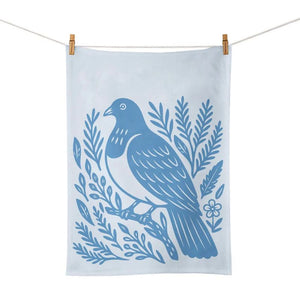 100%NZ Woodcut Kererū Tea Towel pegged to a line, shown against a white background.