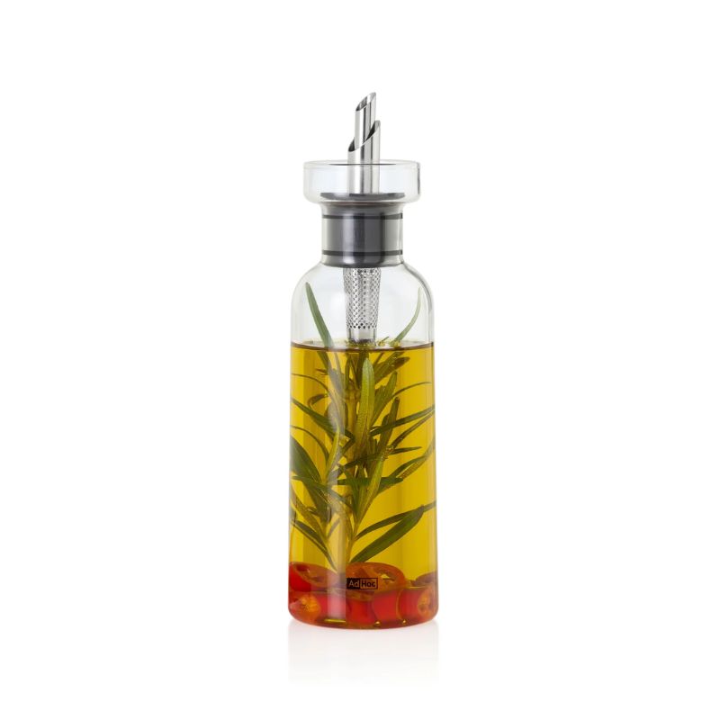 AdHoc oil or vinegar dispenser made from clear borosilicate glass and stainless steel fittings - shown on a white background