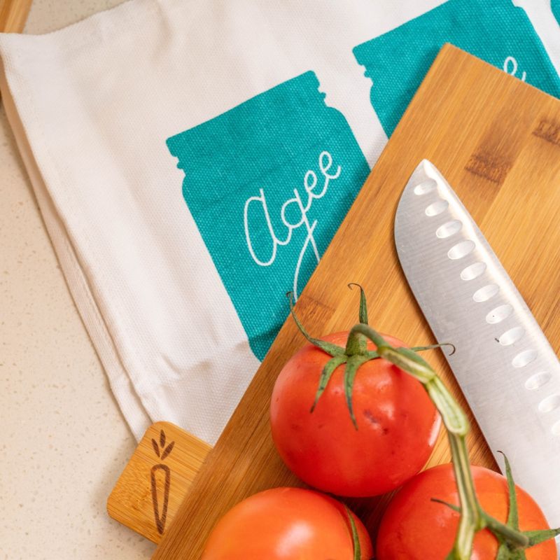 Agee tea towel with blue jar design and Agee branding - 100% cotton kitchen towel