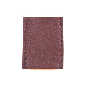 Brown pouch used to store replacement bread dough lame blades, shown against a white background.