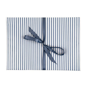 Striped smoky blue gift wrap with a blue ribbon