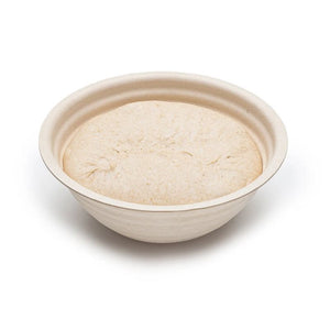 Brod & Taylor Boule Banneton with dough inside on a white background.