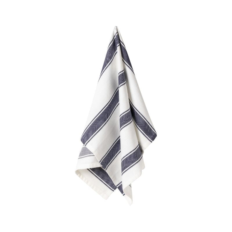 Casafina Alyssa Herringbone Stripe Kitchen Towel in Blueberry hanging to display the classic blue and white striped pattern with herringbone weave detail