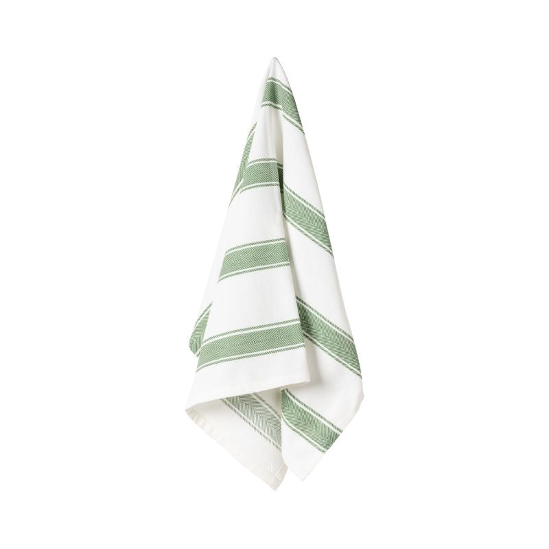 Casafina Alyssa Herringbone Stripe Kitchen Towel in Chive green hanging to display the fresh green and white striped pattern with herringbone weave detail