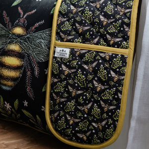 Catherine Rowe Bee Print Double Oven Glove shown with coordinating cushion.