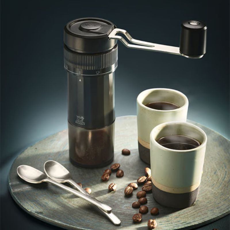 Peugeot Presto Manual Coffee Grinder with handle attached - stylish black design