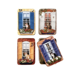 Four designs available in the Dana Kubick Embossed Window Tin collection.