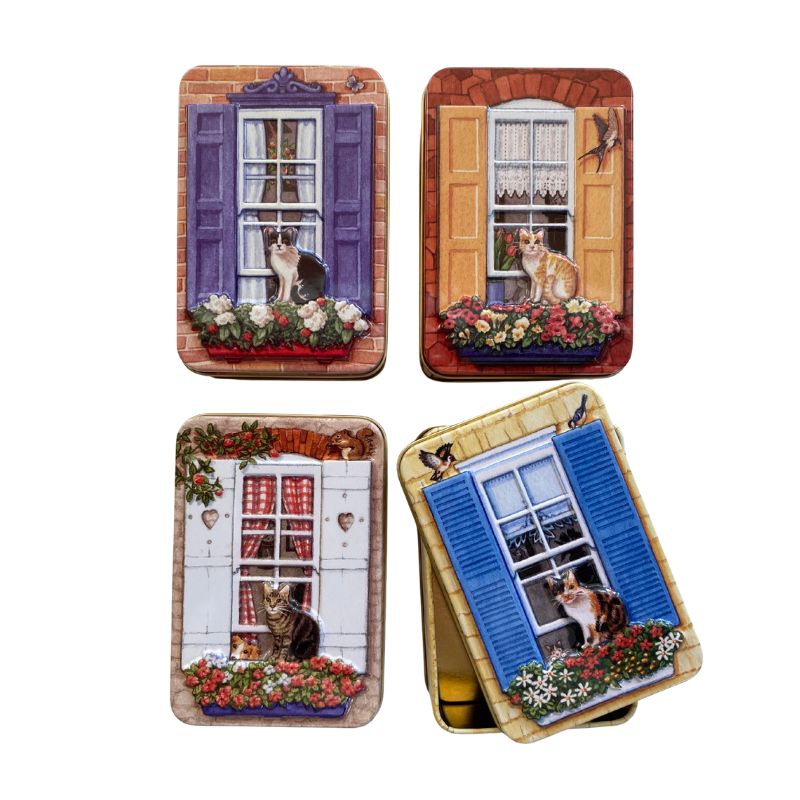 Dana Kubick Embossed Window Cat Tin collection designs - clockwise from top left: Black & White, Ginger, Tabby & Tortoiseshell.