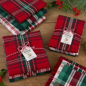 Design Imports Christmas Plaid Tea Towels set of three shown against a wooden table.