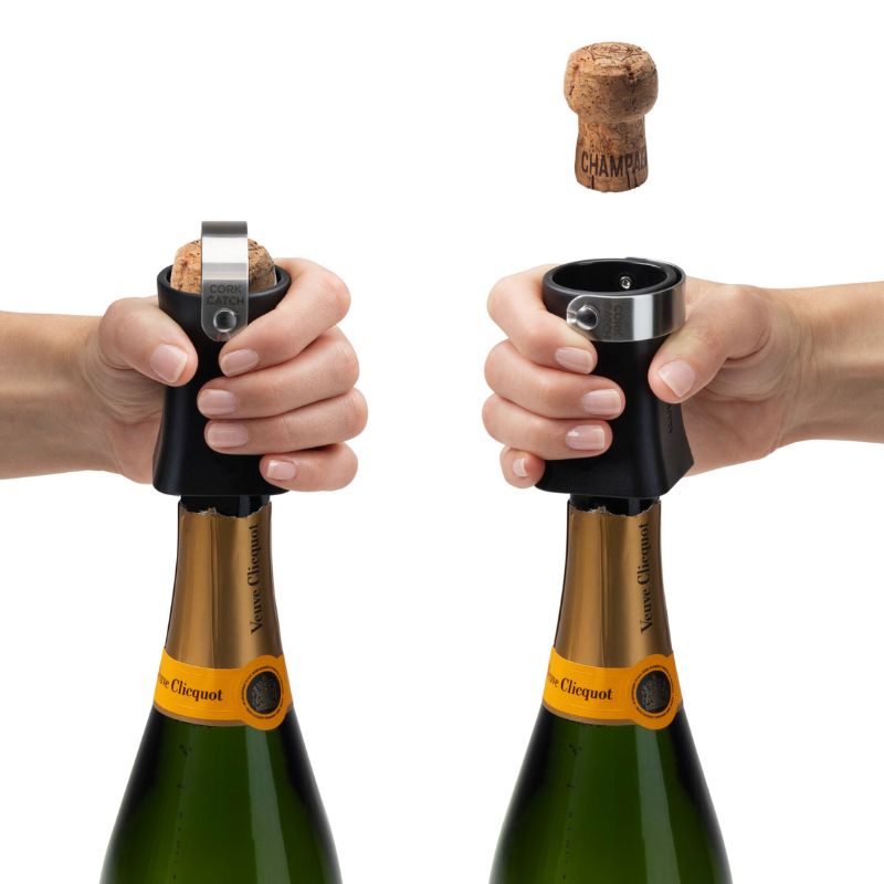 Hands using Dreamfarm Champop to twist and remove a Champagne cork