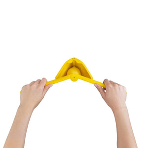 Dreamfarm Fluicer - Lemon Juicer in use and showing grips to hold lemon in place | NZ