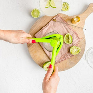 Birdseye view of the Dreamfarm Lime Fluicer in use juicing limes for cocktails | NZ