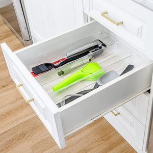 Dreamfarm Fluicer - Lime Juicer folded away flat in a drawer | NZ