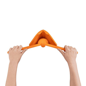 Dreamfarm Fluicer - Orange Juicer in use with grips holding orange in place showing | NZ