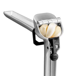Dreamfarm Garject  garlic press loaded with unpeeled garlic cloves - NZ