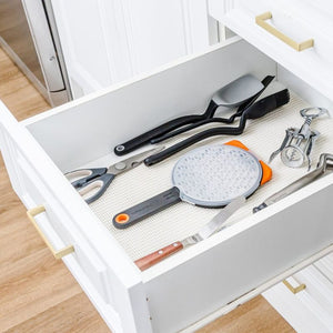 Dreamfarm Ograte Coarse Grater with cover snapped on stored in a drawer space-saving kitchen utensil NZ