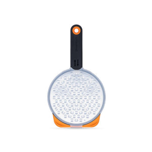 View of Dreamfarm Ograte Two-Sided Speed Grater with protective blade cover.