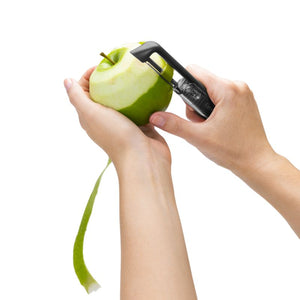Dreamfarm Sharple peeler removing apple skin - sharp apple peeler NZ