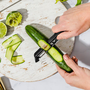 Dreamfarm Sharple peeler cutting zucchini into ribbons - versatile vegetable peeler NZ