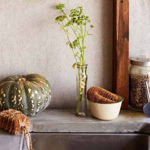 Eco Max Kitchen Scrubber in a enamel bowl on a rustic bench top