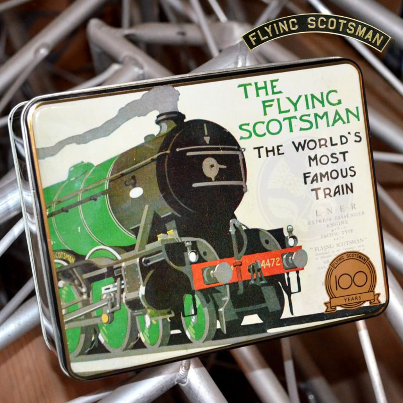 Elite Tins Flying Scotsman Biscuit Tin, deep rectangular shape with green sides and train artwork on lid.