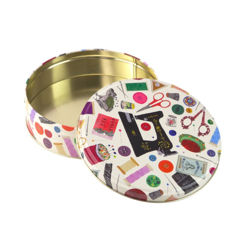 Elite Tins Needle & Thread Medium Round Tin with vintage sewing machine and classic sewing notion print.