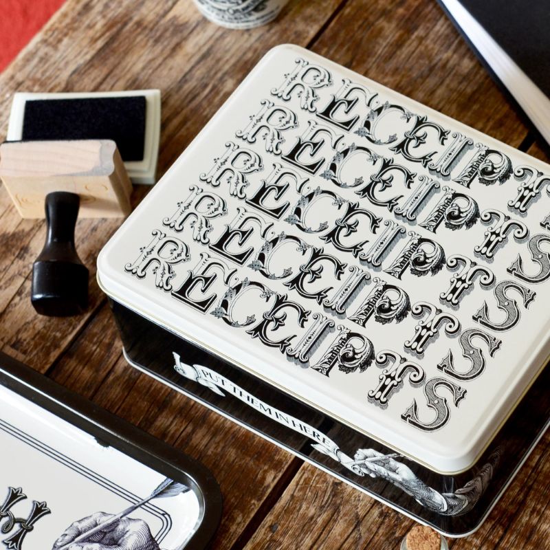 Elite Tins Typography Receipts Tin - black sides with cream lid and black typography.