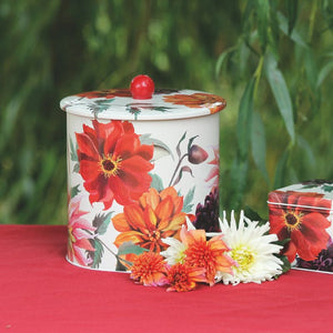 Emma Bridgewater Dahlia Biscuit Barrel styled with fresh dahlias on a red tablecloth