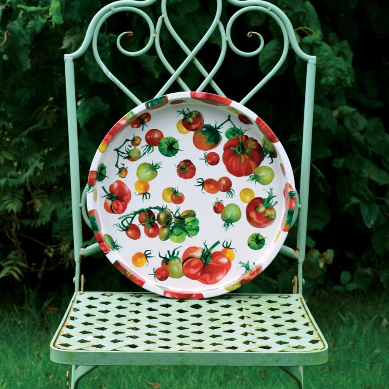 Emma Bridgewater Dig The Garden round tin tray featuring illustrated tomatoes and vines on a white background.