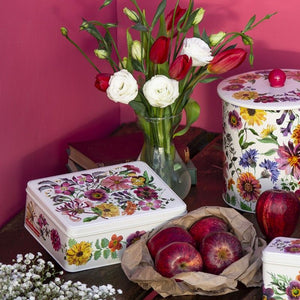 Emma Bridgewater Garden Flowers range showing the rectangular biscuit tin, tall biscuit barrel and apples.