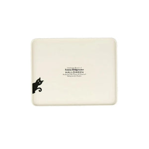 Emma Bridgewater Halloween Witch & Words Biscuit Tin underside.