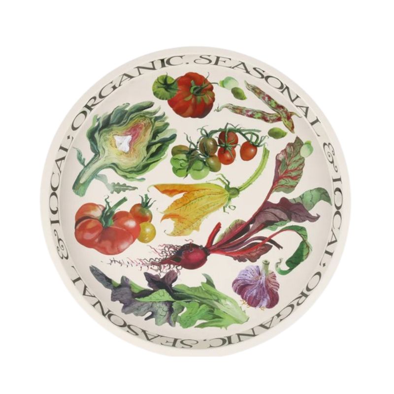 Decorative serving tray featuring vegetables on a white tin with bold black writing on the inner sides