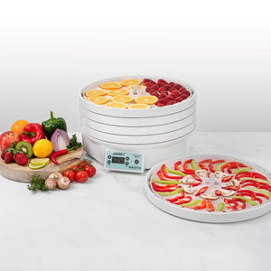 Ezidri FD1000 Digital Dehydrator with fresh produce and filled trays - dehydrating fruits and vegetables
