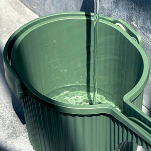 Close up of the Hachiman Garden Beetle Green Watering Can (1.5L) showing the volume markings on the inside