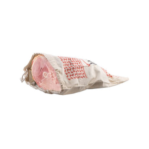 Leg of ham shown in the Appetito Ham Bag with drawstring closure.