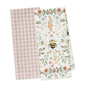 Pink gingham and honey bee print tea towels folded side by side, shown on a white background.