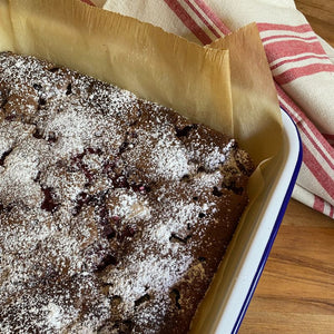 Chocolate brownie in an enamel baking dish lined with If You Care Parchment Baking Paper - NZ kitchen