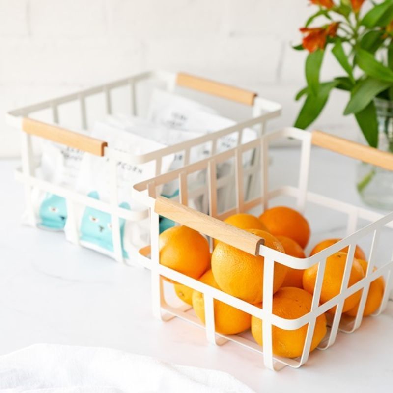 Kate’s Kitchen Metal Basket with Wooden Handles in white, empty, side angle on white background.
