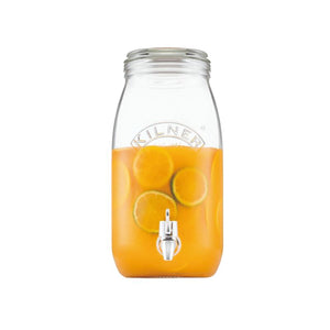 Clear glass drink dispenser by Kilner with lemon slices and a tap on a white background