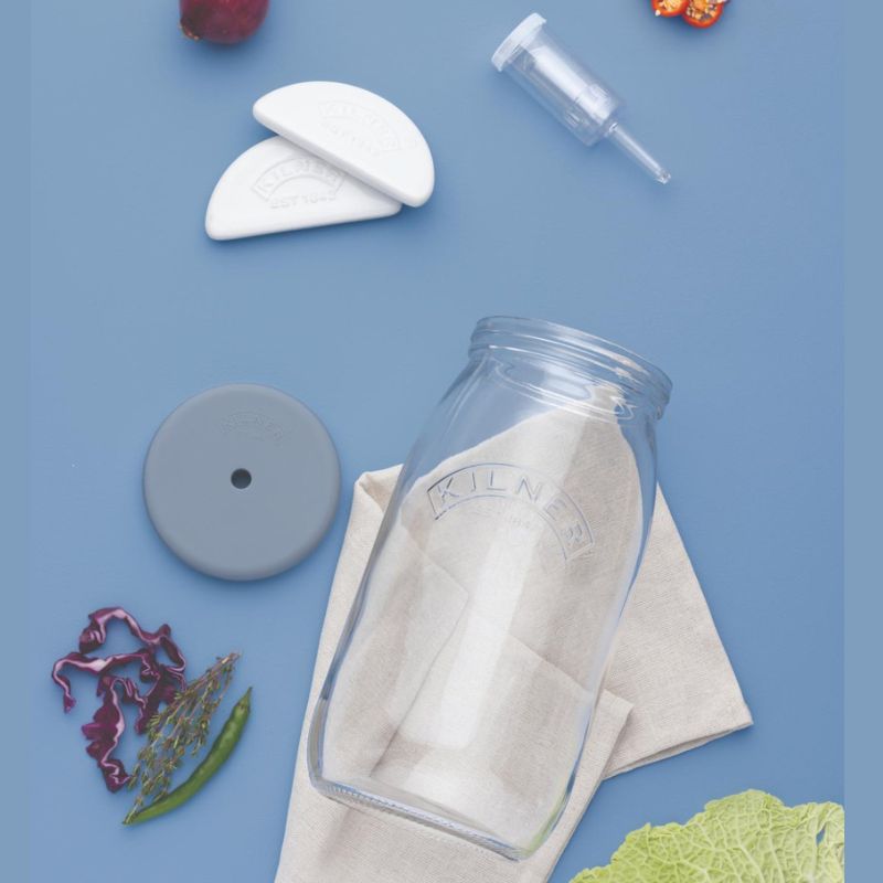 Components of the 3L Kilner Glass Fermentation Set displayed on a blue background
