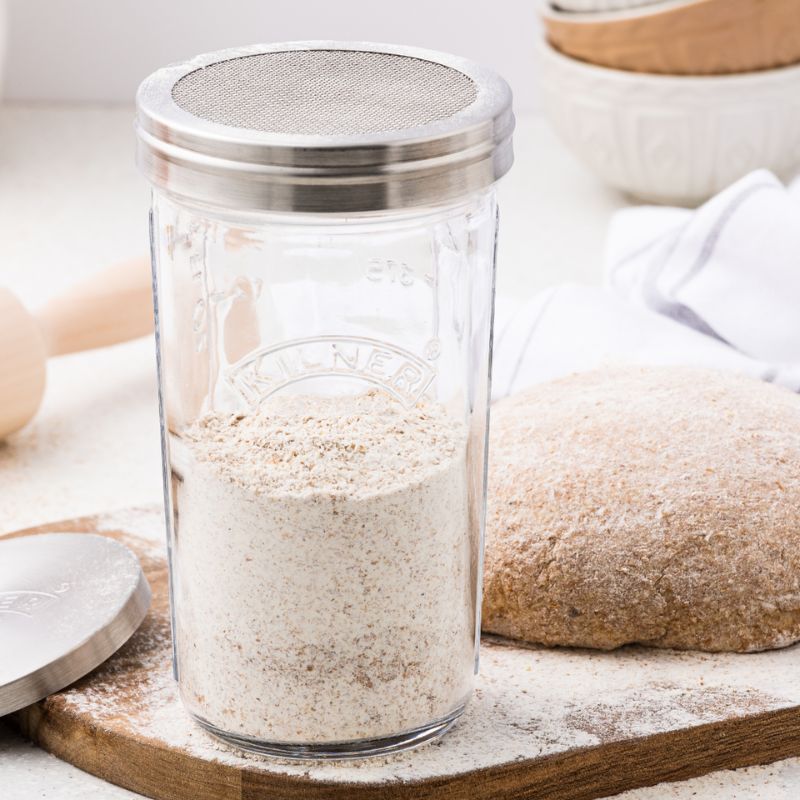 Kilner Glass Sifter Jar filled with flour, shown with stainless steel sifter lid.