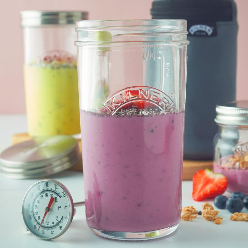Berry yoghurt and chia seeds in a 500 mL jar with the Kilner Yoghurt Making Starter Kit in the background