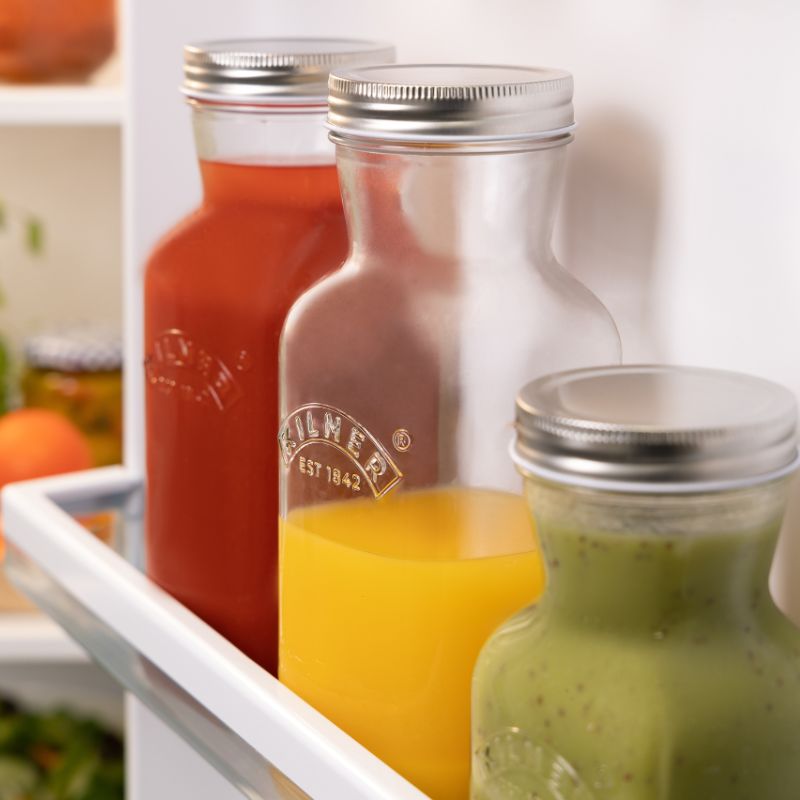 Clear glass Kilner 500ml Juice & Sauce Bottle with silver one-piece lid.