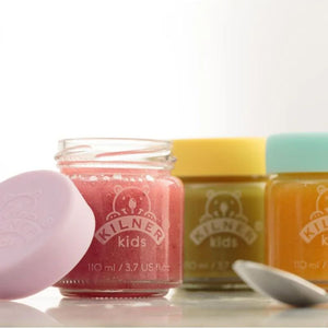 Three small jars filled with different coloured baby food with 'Kilner kids' branding on a white background.