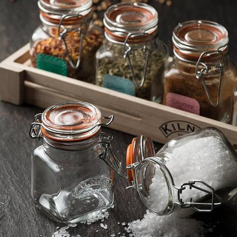 Six Kilner Square Clip Top Spice Jar shown in a wooden crate with spice jar labels and a recipe booklet - a fabulous spice jar set for your salts, herbs and spices