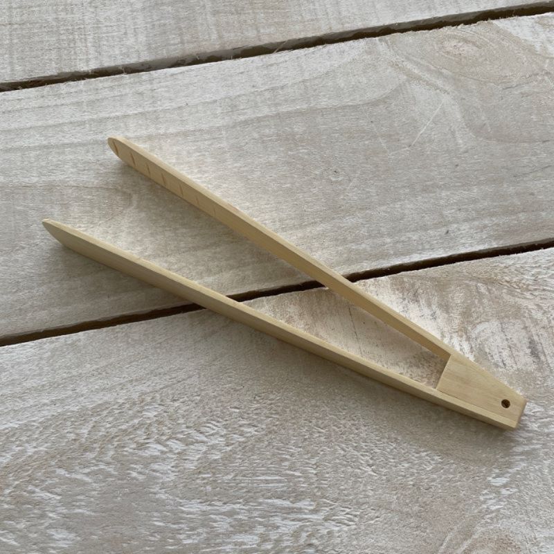 Le Souk Wooden Tongs in citrus - ideal for charcuterie boards.