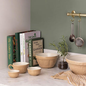 Mason Cash Cane Measuring Cups set of 3 styled next to the mason cash cane mixing bowls.